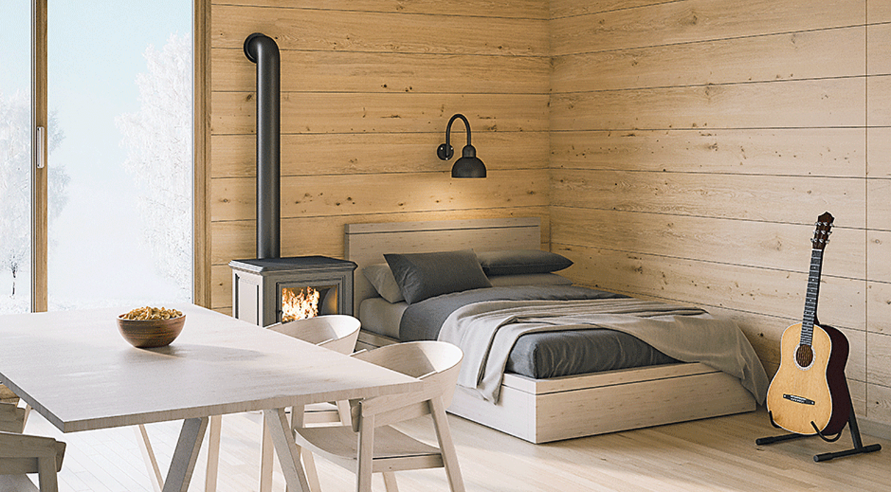 Bauarena Wohnwelt- Schlafzimmer mit Holzwänden
